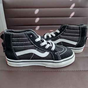 Black and White Vans Mid-Top Sneakers